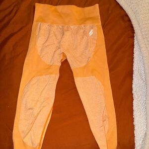 DOYOUEVEN Orange Leggings